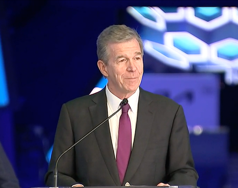 Gov. Cooper signs sports betting bill at Spectrum Center